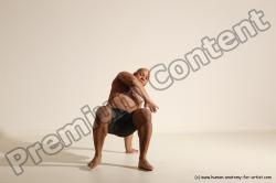 Underwear Gymnastic poses Man Black Muscular Bald Dancing Dynamic poses Academic